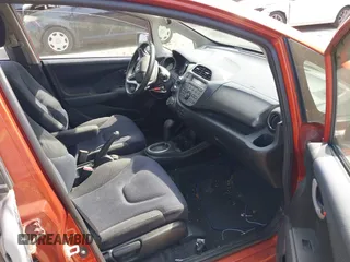 2012 Honda Fit Sport with VIN JHMGE8H55CC006277, listed as a IAAI auction lot 42210793 with 217,068 mi miles and . Bid and sale history available at DreamBid. Image 5.