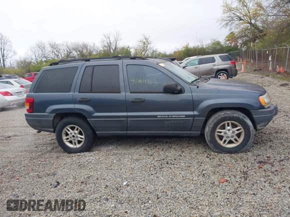 2003 Jeep Grand Cherokee Laredo with VIN 1J4GX48SX3C604904, listed as a IAAI auction lot 40884443 with 188,352 mi miles. Bid and sale history available at carsss.com. Image 13.