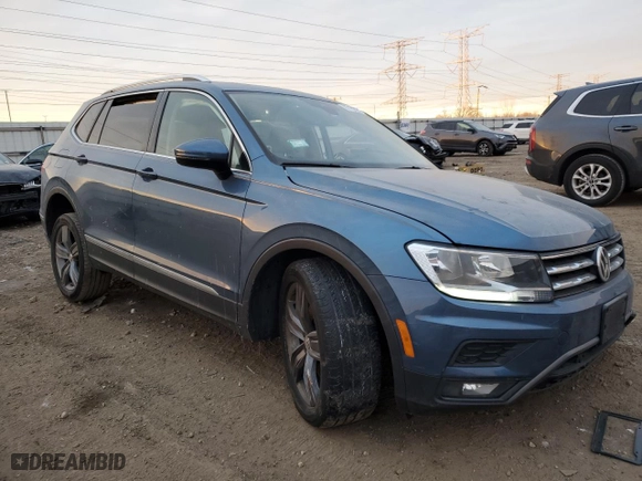 2020 Volkswagen Tiguan SE with VIN 3VV2B7AXXLM181344, listed as a Copart auction lot 87182794 with 62,145 mi miles and Salvage Title. Bid and sale history available at carsss.com. Image 4.