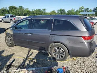 2014 Honda Odyssey Touring z VIN 5FNRL5H90EB007862, wystawiony jako Copart lot #60470005 z przebiegiem 135 686 mil mil oraz Czysty tytuł • Clean title. Historia ofert i sprzedaży dostępna na DreamBid. Obrazek 2.