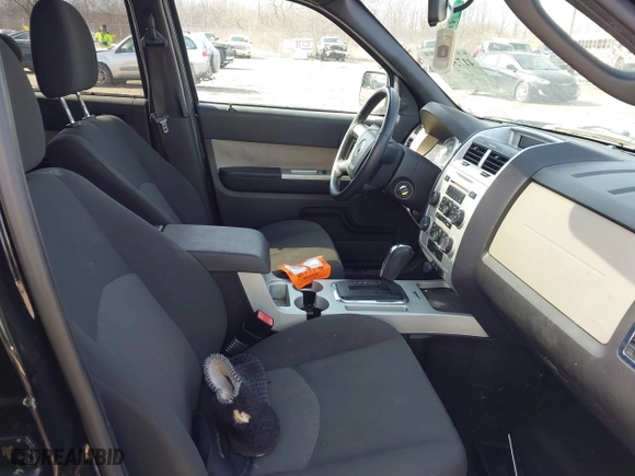 2010 Mercury Mariner with VIN 4M2CN8B79AKJ04672, listed as a IAAI auction lot 41736274 with 129,215 mi miles. Bid and sale history available at carsss.com. Image 5.