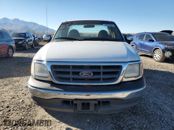 2001 Ford F-150 XL with VIN 1FTRF17L71KF23792, listed as a Copart auction lot 79770894 with Not provided miles and Salvage title. Bid and sale history available at DreamBid. Image 5.