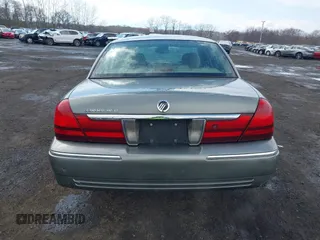 2003 Mercury Grand Marquis LS Premium with VIN 2MEFM75WX3X634344, listed as a IAAI auction lot 41888397 with 129,651 mi miles and . Bid and sale history available at DreamBid. Image 16.