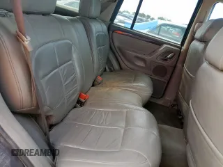 2004 Jeep Grand Cherokee with VIN 1J8GX58J54C121513, listed as a Copart auction lot 59384005 with 221,397 mi miles and Salvage title. Bid and sale history available at DreamBid. Image 11.