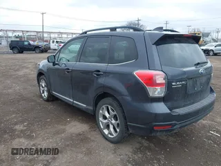 2017 Subaru Forester Touring with VIN JF2SJATC5HH518783, listed as a IAAI auction lot 41889172 with 115,801 mi miles and . Bid and sale history available at DreamBid. Image 3.