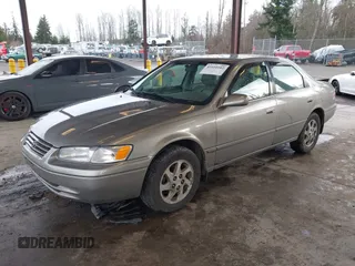 1998 Toyota Camry LE z VIN JT2BF28K1W0109514, wystawiony jako IAAI lot #41610102 z przebiegiem 161 266 mil mil oraz . Historia ofert i sprzedaży dostępna na DreamBid. Obrazek 17.