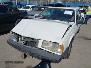 1994 Volvo 900 Action z VIN YV1JS8311R1169592, wystawiony jako IAAI lot #41647893 z przebiegiem 287 426 mil mil oraz . Historia ofert i sprzedaży dostępna na DreamBid. Obrazek 6.