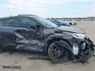 2021 Toyota C-HR LE with VIN JTNKHMBX9M1118773, listed as a IAAI auction lot 41115157 with 57,289 mi miles. Bid and sale history available at carsss.com. Image 6.