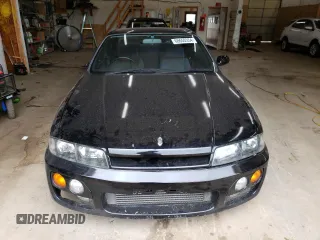1997 Nissan Skyline z VIN HR33101590, wystawiony jako Copart lot #68650354 z przebiegiem 76 082 mil mil oraz Szkoda całkowita • Salvage title. Historia ofert i sprzedaży dostępna na DreamBid. Obrazek 5.