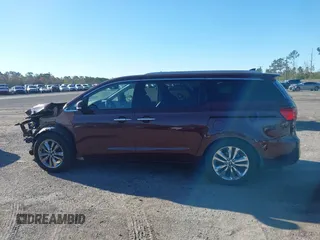 2015 Kia Sedona SX-L with VIN KNDME5C16F6039671, listed as a IAAI auction lot 41736237 with 113,035 mi miles and . Bid and sale history available at DreamBid. Image 14.