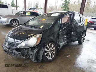 2013 Honda Fit Sport with VIN JHMGE8H57DC033384, listed as a IAAI auction lot 41871356 with 150,777 mi miles. Bid and sale history available at carsss.com. Image 16.