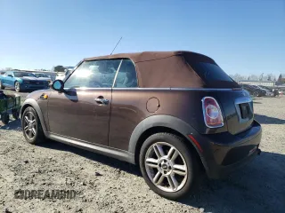 2012 MINI Convertible with VIN WMWZN3C55CT133967, listed as a Copart auction lot 88546705 with 104,357 mi miles and Non repairable. Bid and sale history available at DreamBid. Image 2.