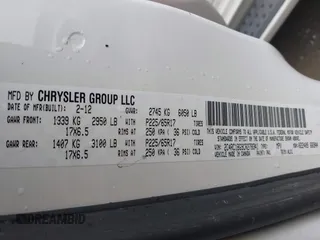 2012 Chrysler Town & Country Touring with VIN 2C4RC1BG9CR278341, listed as a IAAI auction lot 41952677 with 123,282 mi miles and . Bid and sale history available at DreamBid. Image 9.