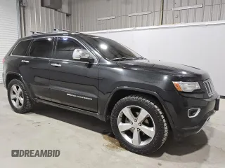 2014 Jeep Grand Cherokee Overland with VIN 1C4RJFCGXEC153250, listed as a Copart auction lot 51327195 with 132,282 mi miles and Clean Title. Bid and sale history available at DreamBid. Image 4.