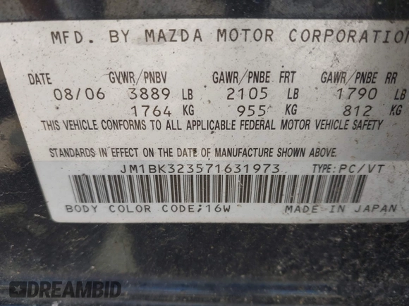 2007 Mazda 3 s Touring with VIN JM1BK323571631973, listed as a IAAI auction lot 41990310 with 287,946 mi miles. Bid and sale history available at carsss.com. Image 9.