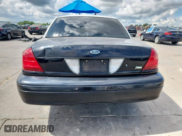 2010 Ford Police Interceptor with VIN 2FABP7BV0AX146445, listed as a Copart auction lot 62375055 with Not provided miles and Salvage title. Bid and sale history available at DreamBid. Image 6.