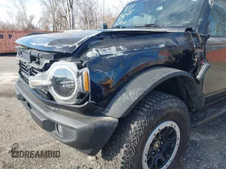 2024 Ford Bronco Big Bend z VIN 1FMDE7BH9RLB43700, wystawiony jako IAAI lot #41989406 z przebiegiem 10 101 mil mil oraz . Historia ofert i sprzedaży dostępna na DreamBid. Obrazek 6.