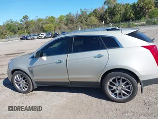 2013 Cadillac SRX Performance Collection with VIN 3GYFNDE39DS654591, listed as a IAAI auction lot 41855098 with 114,965 mi miles. Bid and sale history available at carsss.com. Image 14.