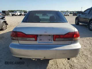 2001 Honda Accord EX z VIN 1HGCG16531A063589, wystawiony jako Copart lot #57875015 z przebiegiem Nie podano mil oraz Szkoda całkowita • Salvage title. Historia ofert i sprzedaży dostępna na DreamBid. Obrazek 6.