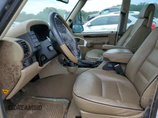 2002 Land Rover Discovery z VIN SALTY12452A763732, wystawiony jako Copart lot #41459004 z przebiegiem 118 405 mil mil oraz Szkody całkowita. Historia ofert i sprzedaży dostępna na DreamBid. Obrazek 7.