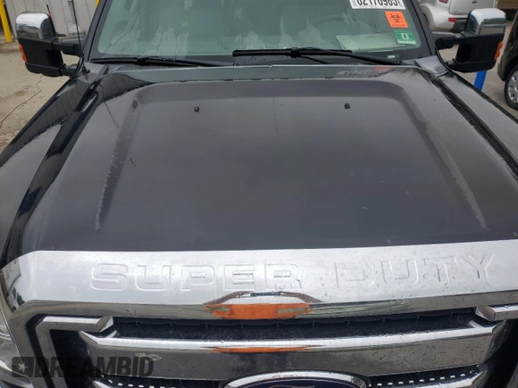 2012 Ford F-250 XL with VIN 1FT7W2B69CEB27556, listed as a Copart auction lot 62176985 with 171,669 mi miles and Salvage title. Bid and sale history available at DreamBid. Image 11.