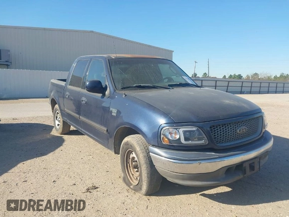 2003 Ford F-150 XLT with VIN 1FTRW07673KC94022, listed as a IAAI auction lot 41789268 with 271,047 mi miles. Bid and sale history available at carsss.com. Image 1.