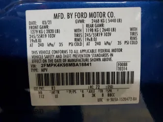 2021 Ford Edge Titanium with VIN 2FMPK4K98MBA18841, listed as a Copart auction lot 56207745 with 69,249 mi miles and Salvage title. Bid and sale history available at DreamBid. Image 13.