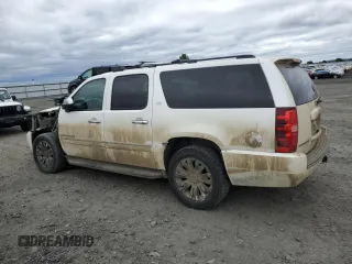 2010 Chevrolet Suburban LTZ with VIN 1GNUKKE33AR183330, listed as a Copart auction lot 50659365 with 234,269 mi miles and Salvage Title. Bid and sale history available at carsss.com. Image 2.