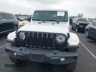 2022 Jeep Gladiator Willys with VIN 1C6HJTAG1NL148524, listed as a IAAI auction lot 41507693 with 42,004 mi miles and . Bid and sale history available at DreamBid. Image 12.