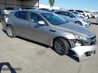 2012 Kia Optima LX with VIN 5XXGM4A71CG034263, listed as a IAAI auction lot 41820368 with 327,479 mi miles. Bid and sale history available at carsss.com. Image 1.
