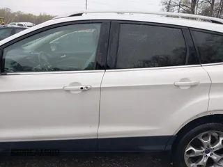 2014 Ford Escape Titanium with VIN 1FMCU9J94EUD49614, listed as a IAAI auction lot 42005864 with 87,779 mi miles. Bid and sale history available at carsss.com. Image 14.