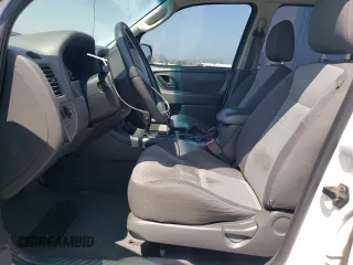 2006 Ford Escape XLS with VIN 1FMCU02Z36KA71926, listed as a Copart auction lot 57697364 with 225,212 mi miles and Salvage title. Bid and sale history available at DreamBid. Image 7.