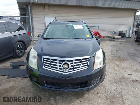 2013 Cadillac SRX Luxury Collection z VIN 3GYFNCE35DS607553, wystawiony jako IAAI lot #42151522 z przebiegiem 104 688 mil mil oraz . Historia ofert i sprzedaży dostępna na DreamBid. Obrazek 12.