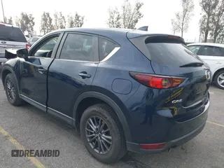 2019 Mazda CX-5 Touring with VIN JM3KFACM5K0697137, listed as a IAAI auction lot 41720253 with 50,416 mi miles. Bid and sale history available at carsss.com. Image 3.