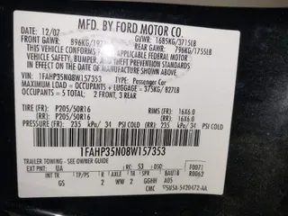 2008 Ford Focus SE with VIN 1FAHP35N08W157353, listed as a IAAI auction lot 41612196 with NaN miles. Bid and sale history available at carsss.com. Image 9.
