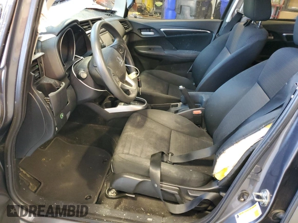 2020 Honda Fit LX z VIN 3HGGK5H46LM710780, wystawiony jako Copart lot #53032525 z przebiegiem 102 541 mil mil oraz Szkoda całkowita • Salvage title. Historia ofert i sprzedaży dostępna na DreamBid. Obrazek 7.