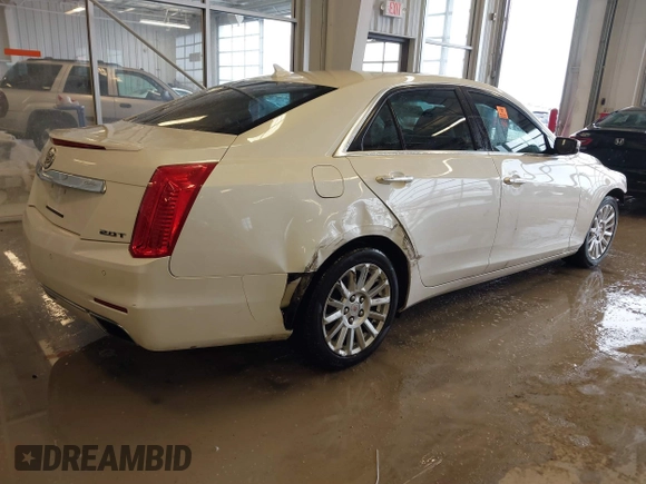 2014 Cadillac CTS Sedan RWD with VIN 1G6AP5SX4E0123768, listed as a IAAI auction lot 41581568 with 69,442 mi miles. Bid and sale history available at carsss.com. Image 4.