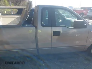 2004 Ford F-150 XL with VIN 1FTRF12W94NA93705, listed as a IAAI auction lot 41965446 with 209,097 mi miles. Bid and sale history available at carsss.com. Image 13.