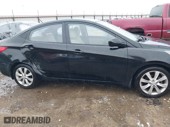 2013 Hyundai Accent GLS with VIN KMHCU4AE9DU379870, listed as a IAAI auction lot 41534029 with 102,610 mi miles. Bid and sale history available at carsss.com. Image 13.