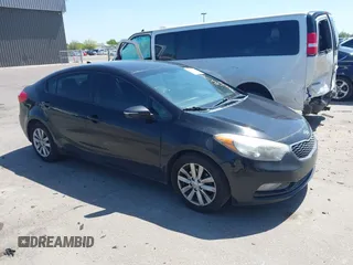 2016 Kia Forte LX with VIN KNAFX4A64G5444265, listed as a IAAI auction lot 42174928 with 211,329 mi miles. Bid and sale history available at carsss.com. Image 1.