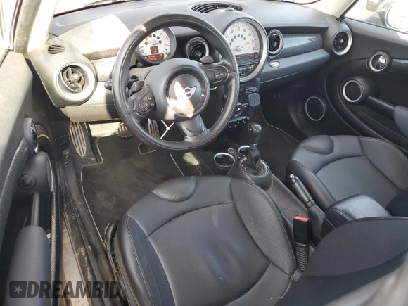 2012 MINI Hardtop S with VIN WMWSV3C54CT386098, listed as a Copart auction lot 52742075 with 119,432 mi miles and Salvage Title. Bid and sale history available at DreamBid. Image 8.