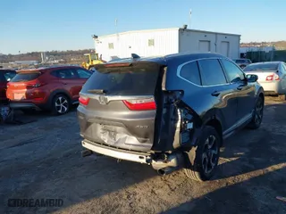 2017 Honda CR-V Touring with VIN 2HKRW2H90HH647274, listed as a IAAI auction lot 41572666 with 95,264 mi miles. Bid and sale history available at carsss.com. Image 6.