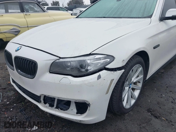 2014 BMW 5 Series 535i with VIN WBA5B1C57ED475963, listed as a IAAI auction lot 41914997 with 92,037 mi miles and . Bid and sale history available at DreamBid. Image 6.