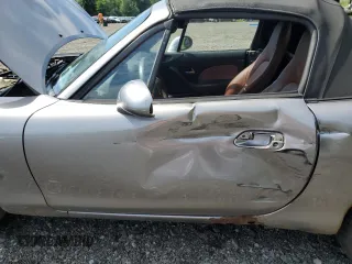 2002 Mazda MX-5 Miata Cloth z VIN JM1NB353520224582, wystawiony jako Copart lot #63669835 z przebiegiem 88 455 mil mil oraz Szkoda całkowita • Salvage title. Historia ofert i sprzedaży dostępna na DreamBid. Obrazek 7.