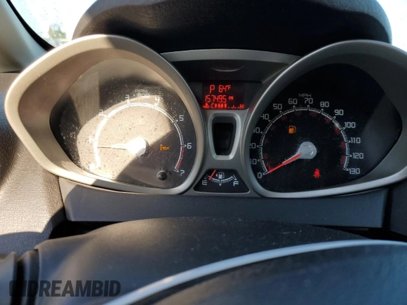 2013 Ford Fiesta SE z VIN 3FADP4BJ9DM186382, wystawiony jako Copart lot #67754934 z przebiegiem 157 495 mil mil oraz Szkoda całkowita • Salvage title. Historia ofert i sprzedaży dostępna na DreamBid. Obrazek 9.