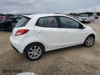 2012 Mazda Mazda2 Touring with VIN JM1DE1LY8C0137590, listed as a Copart auction lot 74488974 with 0 mi miles and Salvage Title. Bid and sale history available at carsss.com. Image 3.