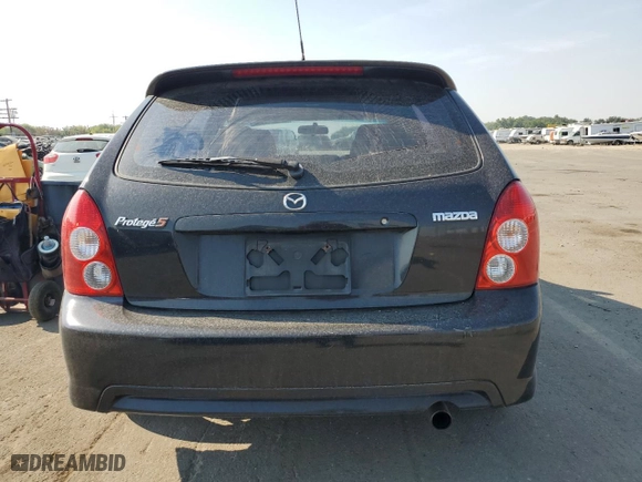 2002 Mazda Protege5 with VIN JM1BJ245521605751, listed as a Copart auction lot 70414364 with NaN miles and Salvage Title. Bid and sale history available at carsss.com. Image 6.