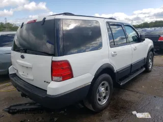 2003 Ford Expedition Special Service z VIN 1FMPU16L63LC45698, wystawiony jako Copart lot #70058684 z przebiegiem 163 798 mil mil oraz Szkoda całkowita • Salvage title. Historia ofert i sprzedaży dostępna na DreamBid. Obrazek 3.
