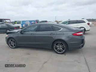 2015 Ford Fusion Titanium with VIN 3FA6P0K95FR181919, listed as a IAAI auction lot 41744443 with 127,572 mi miles. Bid and sale history available at carsss.com. Image 14.