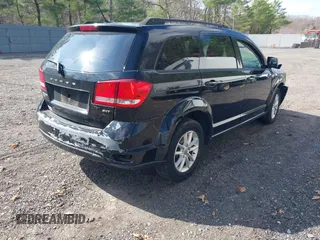 2017 Dodge Journey SXT z VIN 3C4PDDBG6HT578431, wystawiony jako IAAI lot #42009978 z przebiegiem 105 411 mil mil oraz . Historia ofert i sprzedaży dostępna na DreamBid. Obrazek 4.